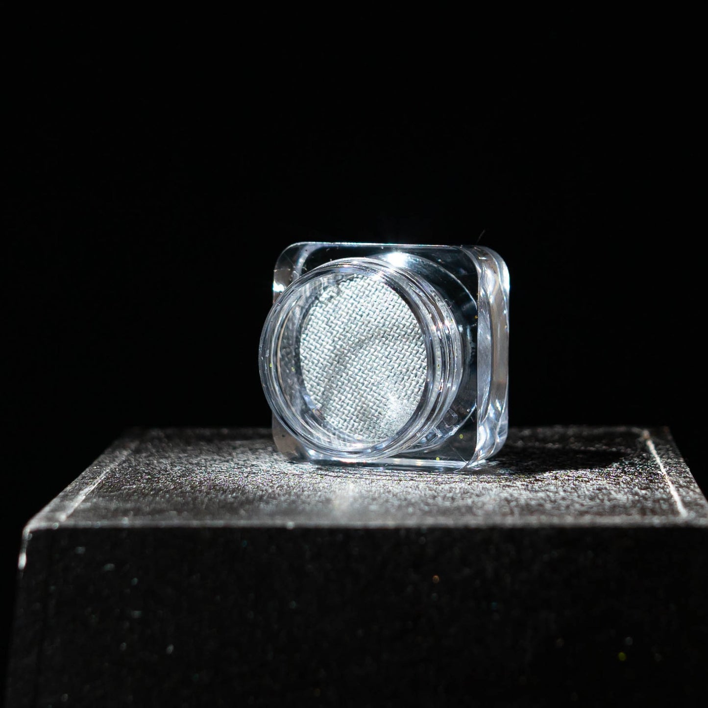 Metallic water activated eyeliner In shade sorcerer , a silver eyeliner